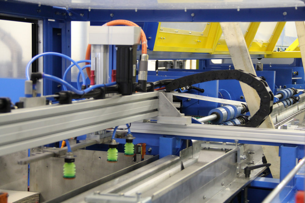 Automated battery assembly line increases production and reduces headcount